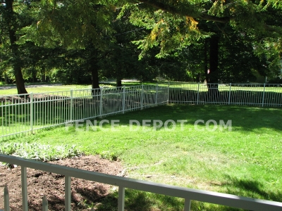 white-aluminum-fence-on-a-slope